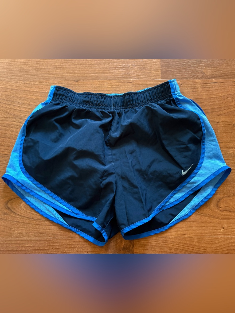 Nike Women's Black Athletic Shorts with Blue Trim